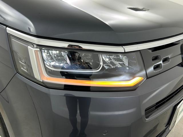 ステップワゴン e:HEVエアー EX フリップダウンモニター 純正ナビ 全方位カメラ BSM ビルトインETC 前席シートヒーター パワーバックドア レーダークルーズコントロール 衝突軽減システム 両側パワースライドドア オットマン(55枚目)