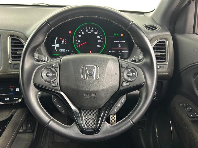 ヴェゼル ハイブリッドＲＳ・ホンダセンシング　純正ナビ　バックカメラ　ＥＴＣ　追従式クルーズコントロール　衝突軽減ブレーキ　車線逸脱警報　電子パーキングシステム　ブレーキホールド　パドルシフト　アルミペダル　純正フロアマット　純正ドアバイザー（9枚目）