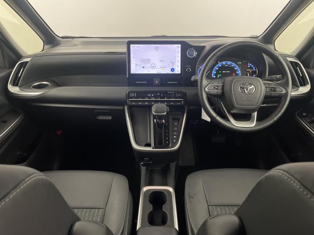 ノア ハイブリッドZ 純正ナビ 地デジフルセグ バックカメラ ETC2.0 追従式クルーズコントロール 車線逸脱警報 衝突軽減ブレーキ オートマチックハイビーム シートヒーター AC100V オットマン 純正ドアバイザー(7枚目)