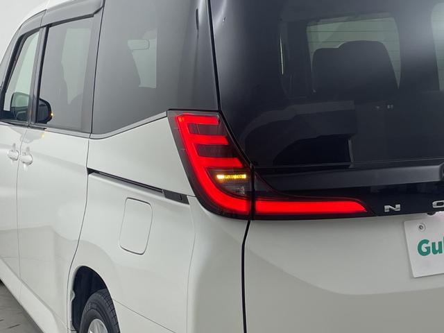 ノア ハイブリッドZ 純正ナビ 地デジフルセグ バックカメラ ETC2.0 追従式クルーズコントロール 車線逸脱警報 衝突軽減ブレーキ オートマチックハイビーム シートヒーター AC100V オットマン 純正ドアバイザー(62枚目)