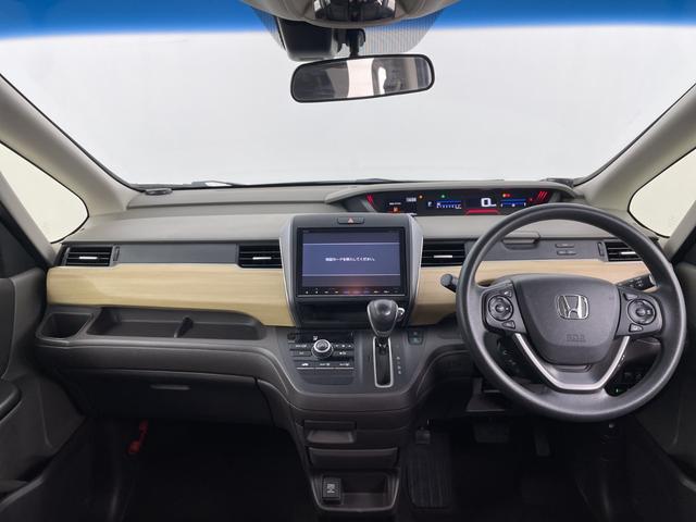 フリード Ｇ・ホンダセンシング　純正９インチナビ　フロントカメラ　バックカメラ　フルセグＴＶ　Ｂｌｕｅｔｏｏｔｈ　両側パワースライドドア　ビルトインＥＴＣ　前後コーナーセンサー　衝突軽減システム　レーダークルーズコントロール（7枚目）