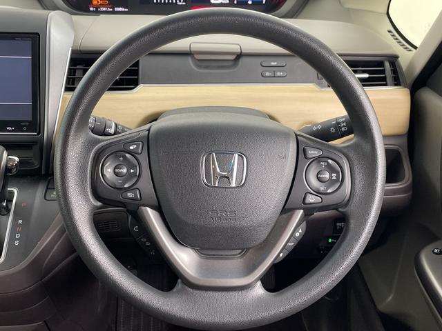 フリード Ｇ・ホンダセンシング　純正９インチナビ　フロントカメラ　バックカメラ　フルセグＴＶ　Ｂｌｕｅｔｏｏｔｈ　両側パワースライドドア　ビルトインＥＴＣ　前後コーナーセンサー　衝突軽減システム　レーダークルーズコントロール（10枚目）