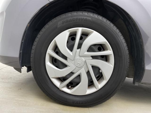 フリード G・ホンダセンシング 社外ナビ バックカメラ 両側パワースライドドア ビルトインETC ドライブレコーダー レーダークルーズコントロール レーンキープアシスト 衝突軽減システム 純正フロアマット アイドリングストップ(70枚目)