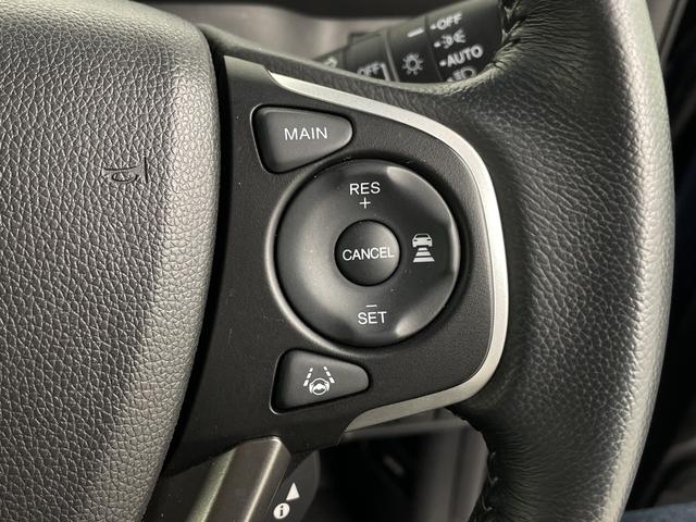 ステップワゴンスパーダ スパーダハイブリッド　Ｇ　ホンダセンシング　フリップダウンモニター　純正ナビ　バックカメラ　前後ドライブレコーダー　ビルトインＥＴＣ　両側パワースライドドア　衝突被害軽減ブレーキ　レーダークルーズコントロール　車線逸脱警報　純正アルミホイール（12枚目）