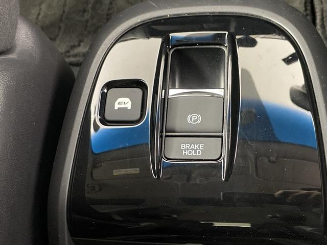 ステップワゴンスパーダ スパーダハイブリッド　Ｇ　ホンダセンシング　フリップダウンモニター　純正ナビ　バックカメラ　前後ドライブレコーダー　ビルトインＥＴＣ　両側パワースライドドア　衝突被害軽減ブレーキ　レーダークルーズコントロール　車線逸脱警報　純正アルミホイール（18枚目）