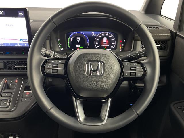 ステップワゴン ｅ：ＨＥＶスパーダ　プレミアムライン　後席モニター　純正ナビ　全方位カメラ　クルーズコントロール　ビルトインＥＴＣ　ＢＳＭ　電動リアゲート　両側パワースライドドア　オットマン　シートヒーター　アダプティブクルーズコントロール　パドルシフト（10枚目）