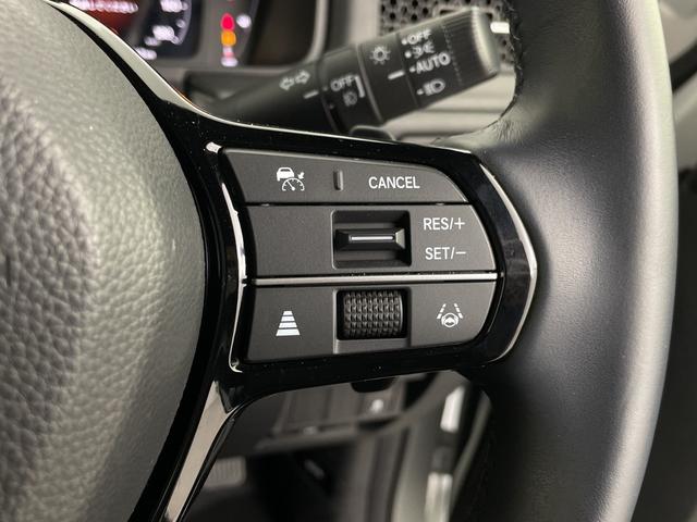 ステップワゴン ｅ：ＨＥＶスパーダ　プレミアムライン　後席モニター　純正ナビ　全方位カメラ　クルーズコントロール　ビルトインＥＴＣ　ＢＳＭ　電動リアゲート　両側パワースライドドア　オットマン　シートヒーター　アダプティブクルーズコントロール　パドルシフト（12枚目）