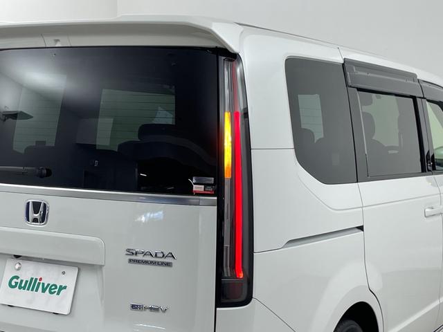 ステップワゴン ｅ：ＨＥＶスパーダ　プレミアムライン　後席モニター　純正ナビ　全方位カメラ　クルーズコントロール　ビルトインＥＴＣ　ＢＳＭ　電動リアゲート　両側パワースライドドア　オットマン　シートヒーター　アダプティブクルーズコントロール　パドルシフト（58枚目）