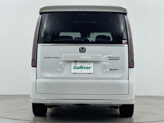 ステップワゴン ｅ：ＨＥＶスパーダ　プレミアムライン　後席モニター　純正ナビ　全方位カメラ　クルーズコントロール　ビルトインＥＴＣ　ＢＳＭ　電動リアゲート　両側パワースライドドア　オットマン　シートヒーター　アダプティブクルーズコントロール　パドルシフト（63枚目）