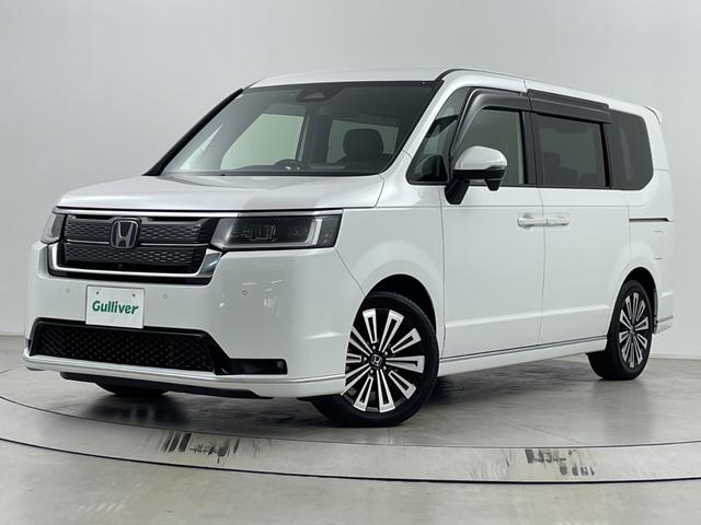 ステップワゴン ｅ：ＨＥＶスパーダ　プレミアムライン　後席モニター　純正ナビ　全方位カメラ　クルーズコントロール　ビルトインＥＴＣ　ＢＳＭ　電動リアゲート　両側パワースライドドア　オットマン　シートヒーター　アダプティブクルーズコントロール　パドルシフト（67枚目）