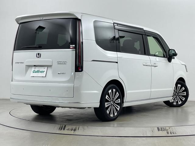 ステップワゴン ｅ：ＨＥＶスパーダ　プレミアムライン　後席モニター　純正ナビ　全方位カメラ　クルーズコントロール　ビルトインＥＴＣ　ＢＳＭ　電動リアゲート　両側パワースライドドア　オットマン　シートヒーター　アダプティブクルーズコントロール　パドルシフト（68枚目）