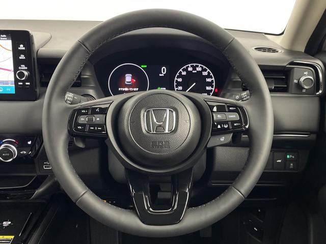 ヴェゼル ｅ：ＨＥＶ　Ｚ　登録済未使用車　純正ナビ　バックカメラ　ビルトインＥＴＣ２．０　ＢＳＭ　ワイヤレス充電器　前席シートヒーター　ステアリングヒーター　電動リアゲート　衝突軽減ブレーキ　アダプティブクルーズコントロール（10枚目）