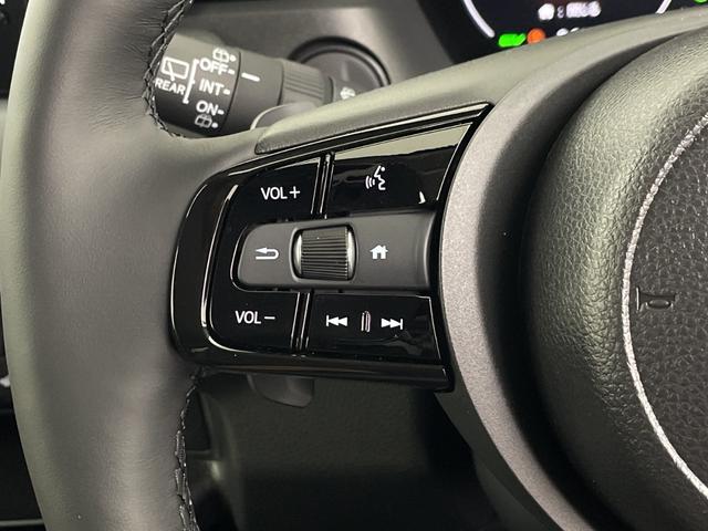 ヴェゼル ｅ：ＨＥＶ　Ｚ　登録済未使用車　純正ナビ　バックカメラ　ビルトインＥＴＣ２．０　ＢＳＭ　ワイヤレス充電器　前席シートヒーター　ステアリングヒーター　電動リアゲート　衝突軽減ブレーキ　アダプティブクルーズコントロール（11枚目）