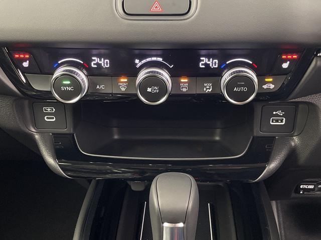 ヴェゼル ｅ：ＨＥＶ　Ｚ　登録済未使用車　純正ナビ　バックカメラ　ビルトインＥＴＣ２．０　ＢＳＭ　ワイヤレス充電器　前席シートヒーター　ステアリングヒーター　電動リアゲート　衝突軽減ブレーキ　アダプティブクルーズコントロール（16枚目）