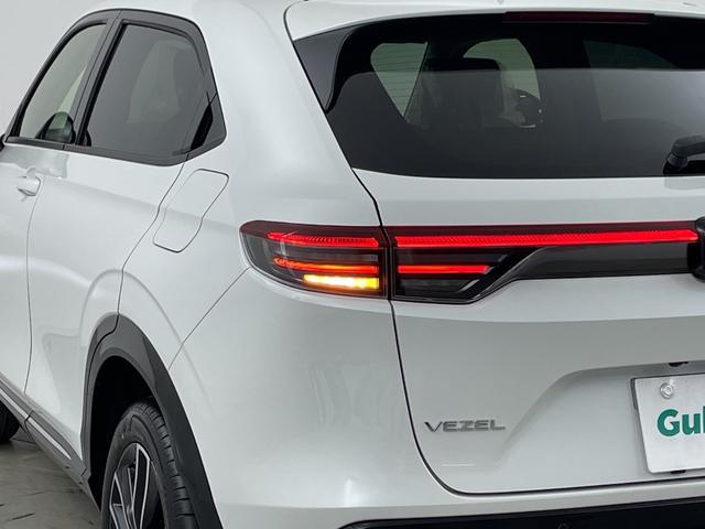 ヴェゼル ｅ：ＨＥＶ　Ｚ　登録済未使用車　純正ナビ　バックカメラ　ビルトインＥＴＣ２．０　ＢＳＭ　ワイヤレス充電器　前席シートヒーター　ステアリングヒーター　電動リアゲート　衝突軽減ブレーキ　アダプティブクルーズコントロール（51枚目）