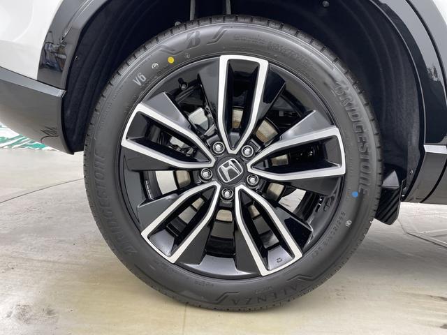 ヴェゼル ｅ：ＨＥＶ　Ｚ　登録済未使用車　純正ナビ　バックカメラ　ビルトインＥＴＣ２．０　ＢＳＭ　ワイヤレス充電器　前席シートヒーター　ステアリングヒーター　電動リアゲート　衝突軽減ブレーキ　アダプティブクルーズコントロール（68枚目）