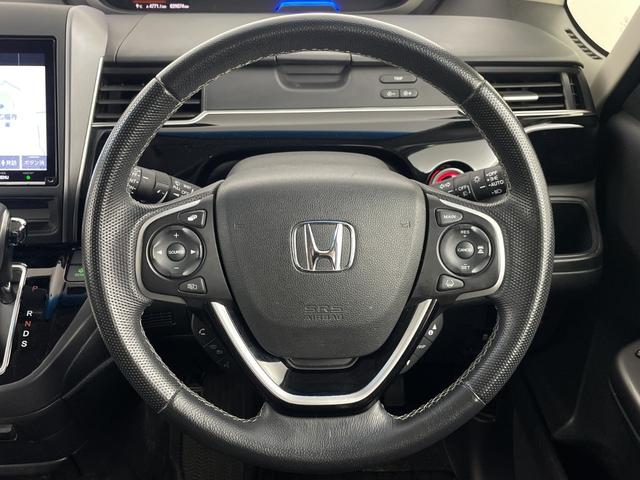 フリード モデューロＸ　ホンダセンシング　純正フリップダウンモニター　純正ナビ　バックカメラ　ビルトインＥＴＣ２．０　前後ドライブレコーダー　両側パワースライドドア　衝突軽減システム　レーダークルーズコントロール　純正１５インチアルミホイール（9枚目）