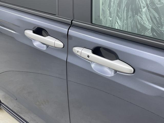 フリード ｅ：ＨＥＶクロスター　登録済未使用車　純正ナビ　バックカメラ　ＢＳＭ　シートヒーター　両側パワースライドドア　アダプティブクルーズコントロール　衝突軽減システム　電子パーキングシステム　ブレードホールド　純正アルミホイール（58枚目）