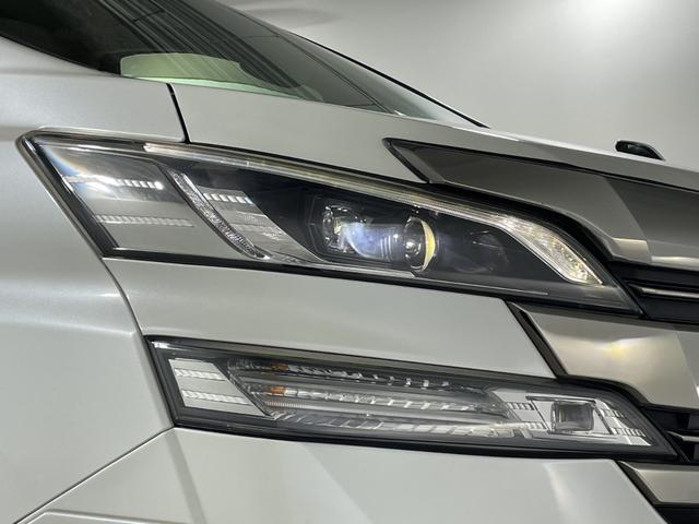 ヴェルファイア ２．５Ｖ　社外１０型ナビ　社外フリップダウンモニター　Ｂカメラ　両側電動　モデリスタエアロ　クルコン　ＰＢＤ　ＬＥＤヘッド／フォグランプ　コンビシート／ステアリング　前席パワーシート　運転席ポジションメモリー（69枚目）