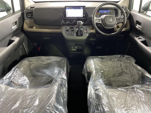 フリード ｅ：ＨＥＶエアー　ＥＸ　登録済未使用車　純正９型ディスプレイオーディオ　ナビ　バックカメラ　フルセグ　両側電動　ホンダセンシング　革巻ステアリング　前席シートヒーター　ＡＨＢ　ＬＥＤヘッドランプ　スマートキー　プッシュＳ（2枚目）