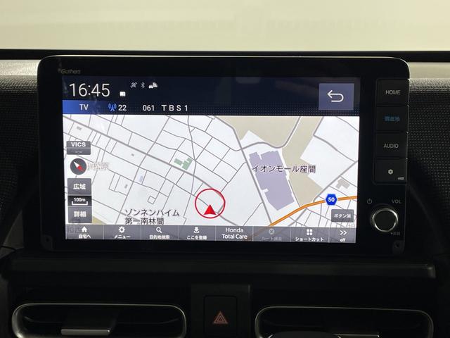 フリード ｅ：ＨＥＶエアー　ＥＸ　登録済未使用車　純正９型ディスプレイオーディオ　ナビ　バックカメラ　フルセグ　両側電動　ホンダセンシング　革巻ステアリング　前席シートヒーター　ＡＨＢ　ＬＥＤヘッドランプ　スマートキー　プッシュＳ（6枚目）