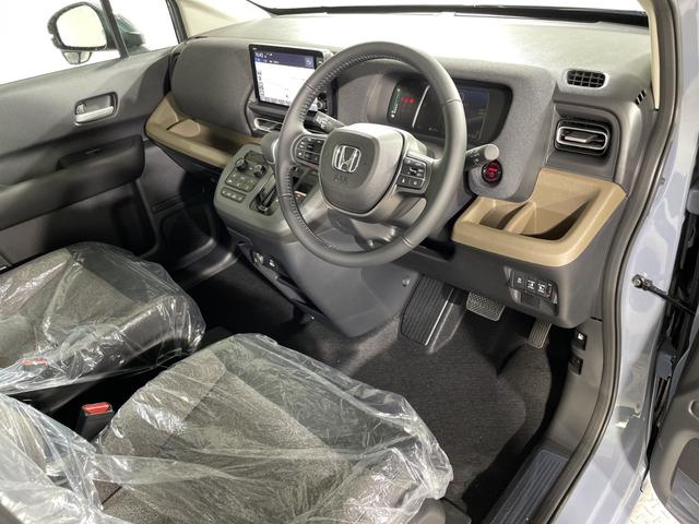 フリード ｅ：ＨＥＶエアー　ＥＸ　登録済未使用車　純正９型ディスプレイオーディオ　ナビ　バックカメラ　フルセグ　両側電動　ホンダセンシング　革巻ステアリング　前席シートヒーター　ＡＨＢ　ＬＥＤヘッドランプ　スマートキー　プッシュＳ（41枚目）