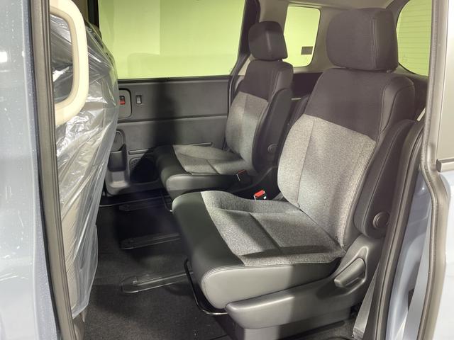 フリード ｅ：ＨＥＶエアー　ＥＸ　登録済未使用車　純正９型ディスプレイオーディオ　ナビ　バックカメラ　フルセグ　両側電動　ホンダセンシング　革巻ステアリング　前席シートヒーター　ＡＨＢ　ＬＥＤヘッドランプ　スマートキー　プッシュＳ（49枚目）