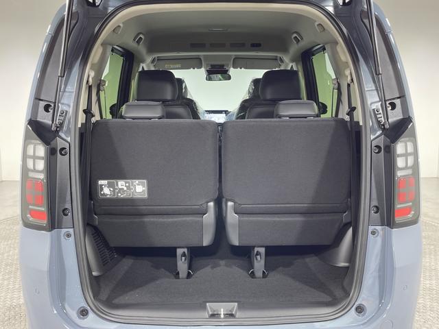 フリード ｅ：ＨＥＶエアー　ＥＸ　登録済未使用車　純正９型ディスプレイオーディオ　ナビ　バックカメラ　フルセグ　両側電動　ホンダセンシング　革巻ステアリング　前席シートヒーター　ＡＨＢ　ＬＥＤヘッドランプ　スマートキー　プッシュＳ（52枚目）