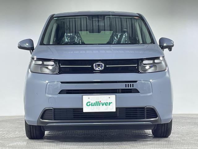 フリード ｅ：ＨＥＶエアー　ＥＸ　登録済未使用車　純正９型ディスプレイオーディオ　ナビ　バックカメラ　フルセグ　両側電動　ホンダセンシング　革巻ステアリング　前席シートヒーター　ＡＨＢ　ＬＥＤヘッドランプ　スマートキー　プッシュＳ（56枚目）