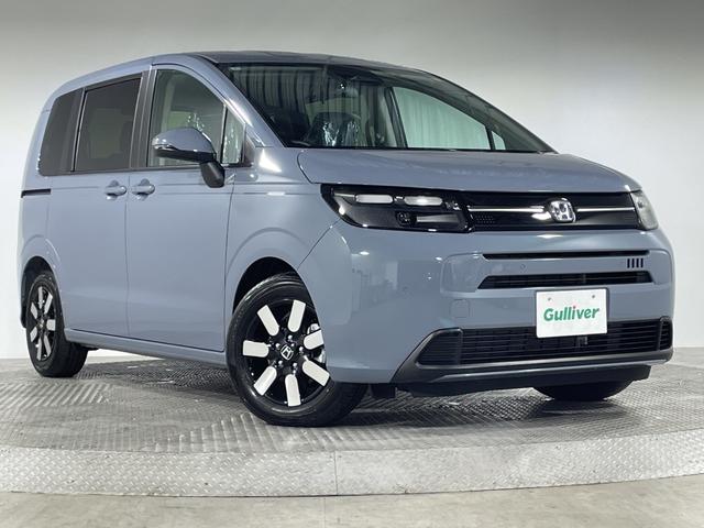 フリード ｅ：ＨＥＶエアー　ＥＸ　登録済未使用車　純正９型ディスプレイオーディオ　ナビ　バックカメラ　フルセグ　両側電動　ホンダセンシング　革巻ステアリング　前席シートヒーター　ＡＨＢ　ＬＥＤヘッドランプ　スマートキー　プッシュＳ（57枚目）