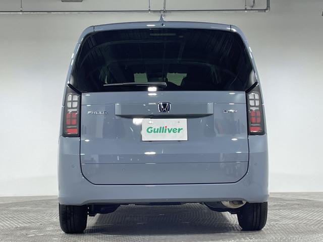 フリード ｅ：ＨＥＶエアー　ＥＸ　登録済未使用車　純正９型ディスプレイオーディオ　ナビ　バックカメラ　フルセグ　両側電動　ホンダセンシング　革巻ステアリング　前席シートヒーター　ＡＨＢ　ＬＥＤヘッドランプ　スマートキー　プッシュＳ（60枚目）