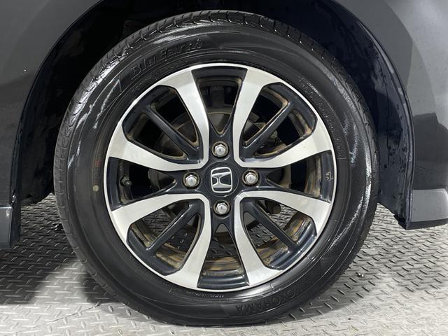 N-BOXカスタム G・Lホンダセンシング 純正8型ナビ TV BT バックカメラ 電動スライドドア 衝突軽減ブレーキ 車線逸脱警報 レーダークルコン 革巻きステアリング ステアリングスイッチ ETC LEDヘッドライト フォグランプ 純アルミ(70枚目)