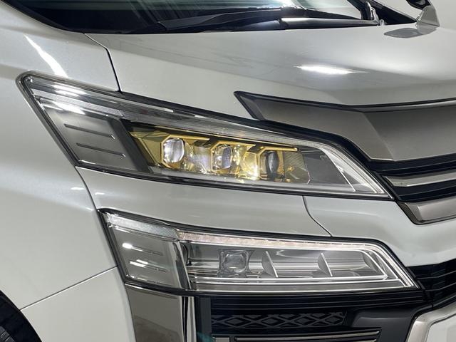 ヴェルファイア ２．５　ゴールデンアイズＩＩ　純正９型ＤＡ　純正１２．１型フリップダウンＭ　Ｂカメラ　両側電動　ＴＳＳ　ＢＳＭ　デジタルインナーミラー　ＰＢＤ　３眼ＬＥＤヘッドランプ　半革シート　革巻ステアリング　スマートキー　プッシュスタート（71枚目）