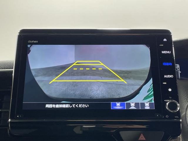 N-BOXカスタム G・Lターボホンダセンシング ホンダセンシング 純正8インチナビ バックカメラ 両側電動スライドドア ハーフレザーシート シートヒーター ビルトインETC 革巻きステアリング パドルシフト LED シーケンシャルウィンカー フォグ(3枚目)