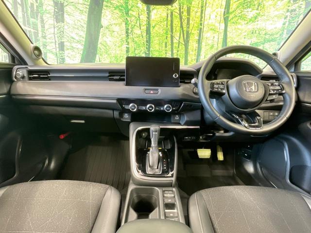 ヴェゼル ｅ：ＨＥＶ　Ｚ　１年保証　全周囲カメラ　衝突被害軽減システム　禁煙車　電動リアゲート　ハーフレザーシート　コーナーセンサー　スマートキー　ＬＥＤヘッド　ＥＴＣ２．０　純正１８インチアルミ　オートライト（2枚目）