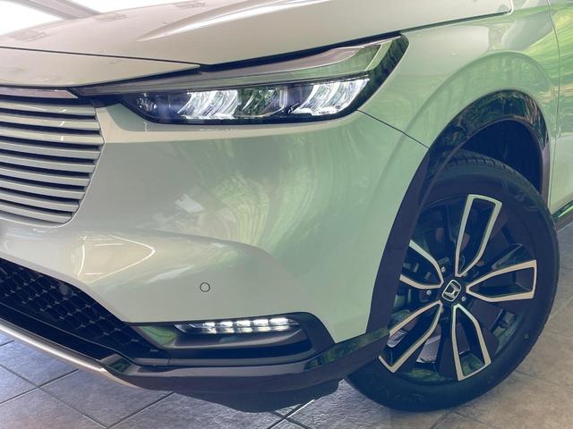 ヴェゼル ｅ：ＨＥＶ　Ｚ　１年保証　全周囲カメラ　衝突被害軽減システム　禁煙車　電動リアゲート　ハーフレザーシート　コーナーセンサー　スマートキー　ＬＥＤヘッド　ＥＴＣ２．０　純正１８インチアルミ　オートライト（12枚目）