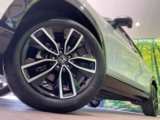 ヴェゼル ｅ：ＨＥＶ　Ｚ　１年保証　全周囲カメラ　衝突被害軽減システム　禁煙車　電動リアゲート　ハーフレザーシート　コーナーセンサー　スマートキー　ＬＥＤヘッド　ＥＴＣ２．０　純正１８インチアルミ　オートライト（13枚目）