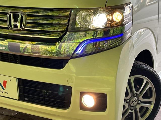 Ｎ－ＢＯＸカスタム Ｇ　ＳＳパッケージ　１年保証付　禁煙車　衝突軽減装置　両側電動スライドドア　ＳＤナビ　バックカメラ　ＥＴＣ　Ｂｌｕｅｔｏｏｔｈ再生　ＣＤ／ＤＶＤ再生　ＨＩＤヘッドライト　純正１４インチアルミホイール　ドアバイザー（12枚目）