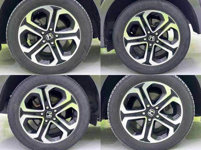ヴェゼル ４ＷＤハイブリッドＺ・ホンダセンシング　新品タイヤ／保証書／社外　ＳＤナビ／シートヒーター／シート　ハーフレザー／ヘッドランプ　ＬＥＤ／ＥＴＣ／ＥＢＤ付ＡＢＳ／横滑り防止装置／アイドリングストップ／フルセグＴＶ／エアバッグ　運転席　４ＷＤ（52枚目）