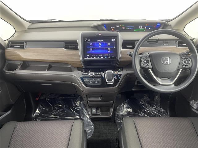 フリードハイブリッド ハイブリッド・Gホンダセンシング 純正9型ナビ 11.6型後席モニター 両側電動スライドドア シートヒーター バックカメラ ETC 追従走行 フルセグTV スマートキー Bluetooth 純正フロアマット 衝突被害軽減 禁煙車(2枚目)