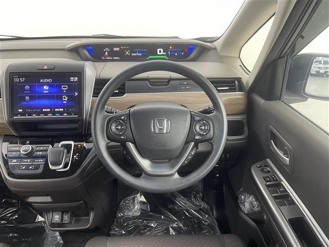 フリードハイブリッド ハイブリッド・Gホンダセンシング 純正9型ナビ 11.6型後席モニター 両側電動スライドドア シートヒーター バックカメラ ETC 追従走行 フルセグTV スマートキー Bluetooth 純正フロアマット 衝突被害軽減 禁煙車(11枚目)