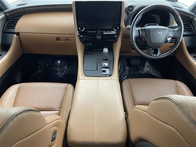 ヴェルファイアハイブリッド Z プレミア ムーンルーフ 後席モニター 茶革 360° BSM 純正14型ナビ 両側電動 オットマン 温シート ベンチレーション デジタルインナーミラー HUD スペアタイヤ アドバンストパーク ETC 禁煙(2枚目)