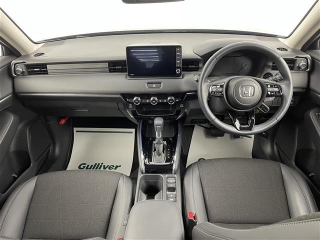 ヴェゼル e:HEV Z 禁煙 純正9型ナビ Bカメラ 温シート BSM ETC 前後ドライブレコーダー Bluetooth LEDヘッドライト ダウンヒルアシスト ホンダセンシング MTモード付AT CD/DVD フルセグ(2枚目)