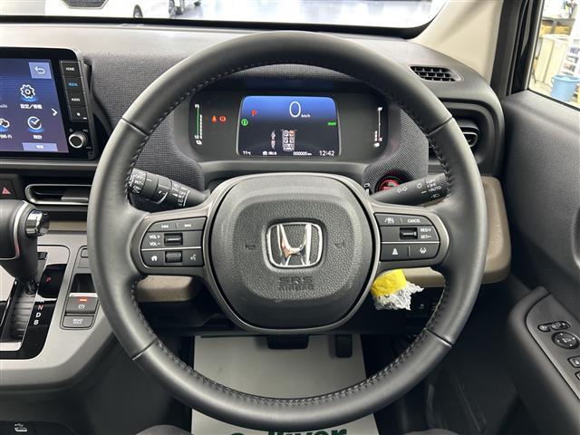 フリード e:HEVエアー EX 登録済未使用車 純正9型ナビ 温シート LED バックカメラ Bluetooth USB端子 フルセグTV BSM ホンダセンシング スマートキー 両側電動 純正15インチAW 衝突被害軽減システム(11枚目)