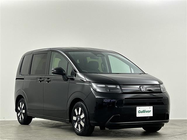 フリード e:HEVエアー EX 登録済未使用車 純正9型ナビ 温シート LED バックカメラ Bluetooth USB端子 フルセグTV BSM ホンダセンシング スマートキー 両側電動 純正15インチAW 衝突被害軽減システム(18枚目)