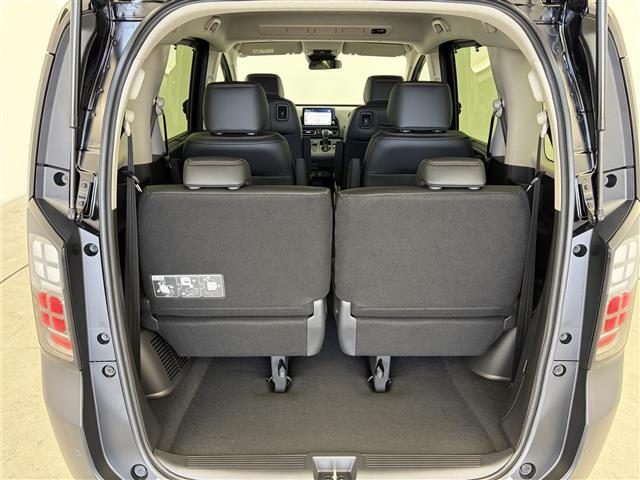 フリード e:HEVクロスター 登録済未使用車 フルセグTV Bluetooth バックモニター BSM アダプティブクルーズコントロール 両側パワースライドドア 純正AW シートヒーター バックカメラ 革巻きステアリング USB(25枚目)