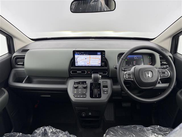 フリード ｅ：ＨＥＶクロスター　登録済未使用車　純正９インチナビ　フルセグＴＶ／Ｂｌｕｅｔｏｏｔｈ　ホンダセンシング　両側パワースライドドア　バックカメラ　ハーフレザーシート　前席シートヒーター　純正１５インチアルミホイール（42枚目）