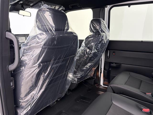 ステップワゴン e:HEVスパーダ 登録済未使用車 純正11.4インチナビ 電動リアゲート 両側パワースライドドア シートヒーター オットマン 純正16インチAW ハーフレザー 衝突軽減ブレーキ AppleCarPlay フルセグTV(25枚目)