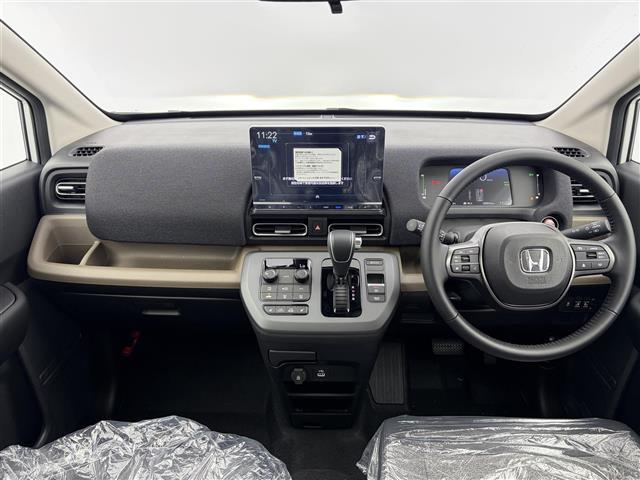 フリード e:HEVエアー EX 登録済未使用車 純正ナビ バックカメラ 両側パワースライドドア ブラインドスポットモニター 純正15インチアルミホイール 衝突軽減ブレーキ アダプティブクルーズコントロール シートヒーター フルセグ(2枚目)