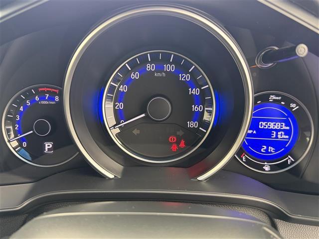 フィット 13G・Lパッケージ シティーブレーキアクティブ【CTBA】 横滑り防止装置 純正ナビ Bluetooth/ワンセグ/AM/FM) 純正ドライブレコーダ アイドリングストップ 革巻きステアオートLEDヘッドライト(4枚目)